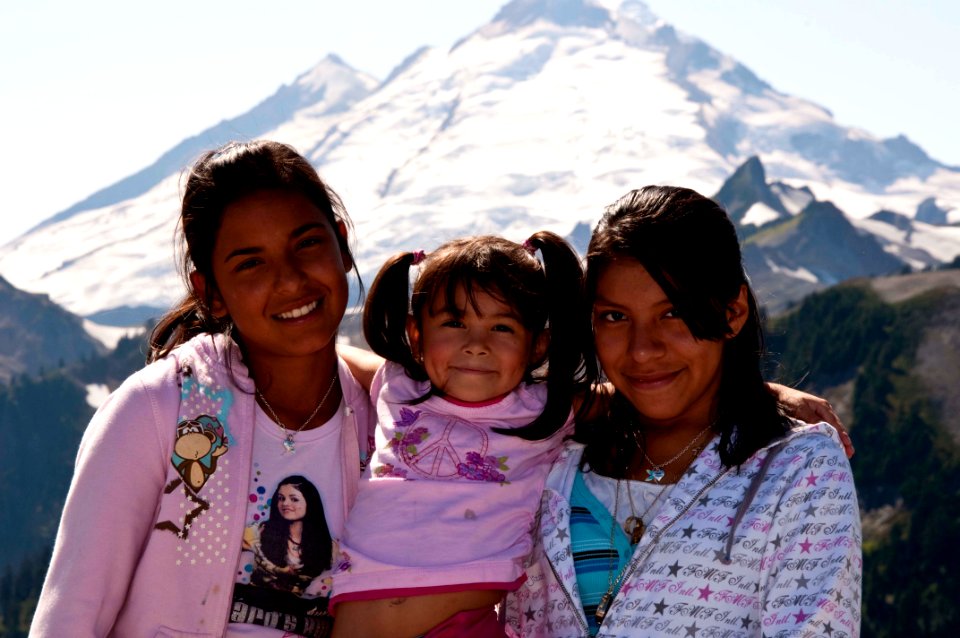 Latino Mother and Daughters at Artists Ridge with Mt Baker in Background, Mt Baker Snoqualmie National Forest