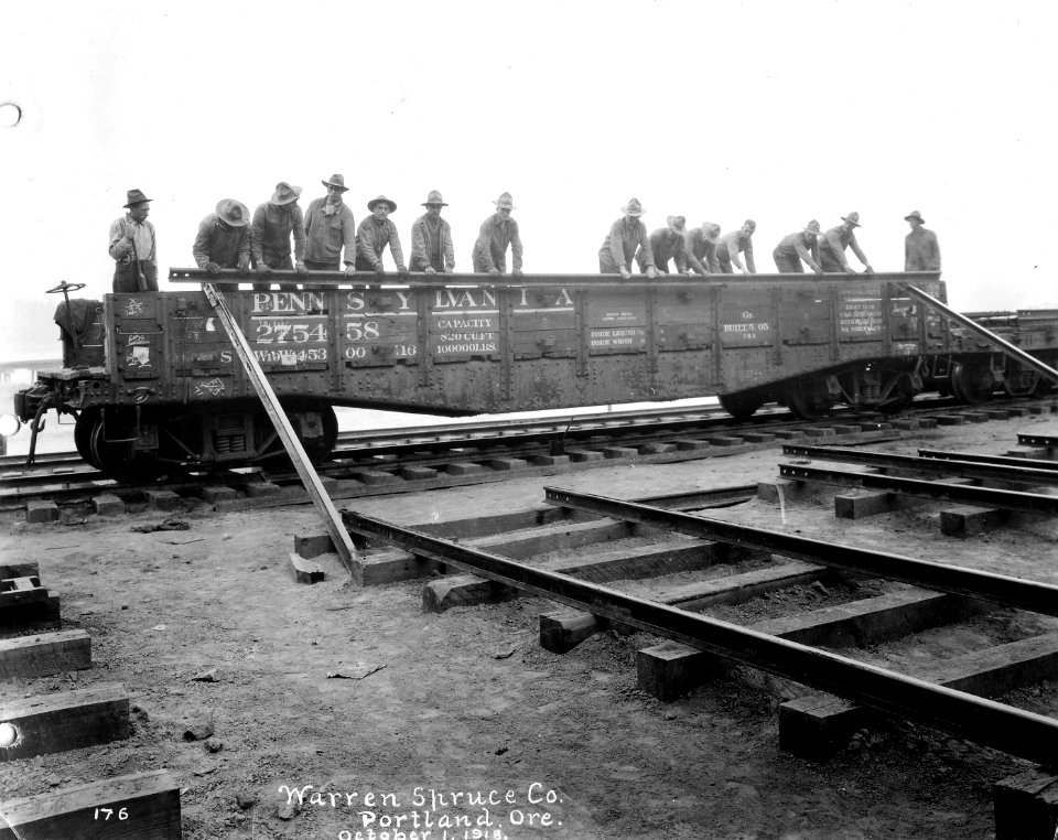 176 Unloading Rails from Rail Car, Yaquina