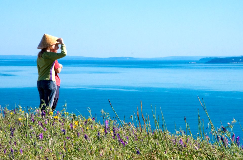Hikers take a break on the Pacific Northwest Trail on Ebeys Landing