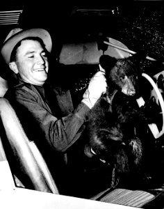 Smokey with Homer Pickens in Small Plane, 1950 photo