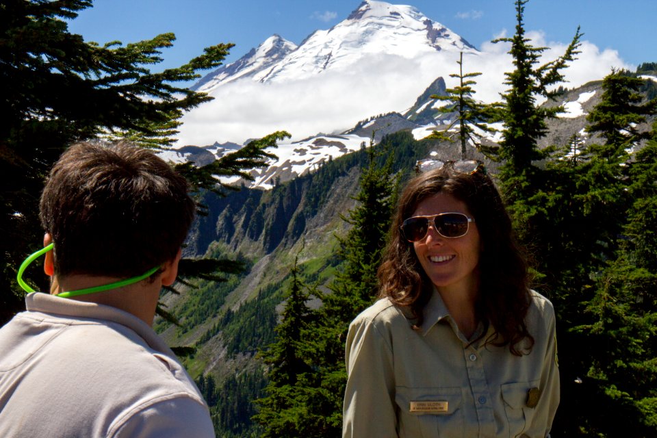 Pair of Forest Service Rangers speaking at Artists Ridge, Mt Baker Snoqualmie National Forest