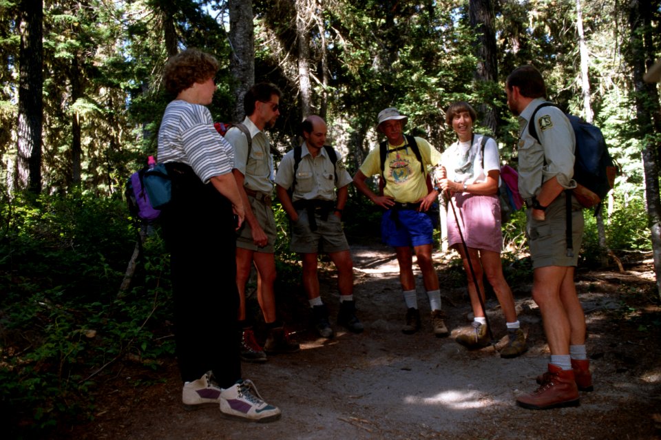 Caring for the land and Serving People, wilderness rangers and hikers