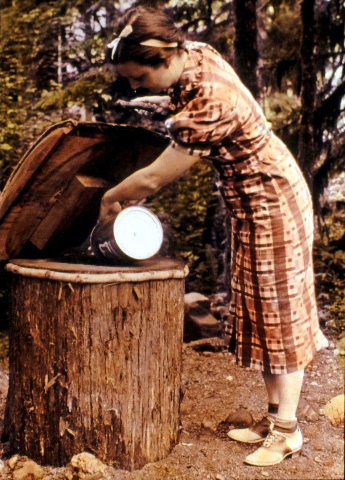 Mt. Hood NF - Woman at Eagle Creek CG Garbage Can