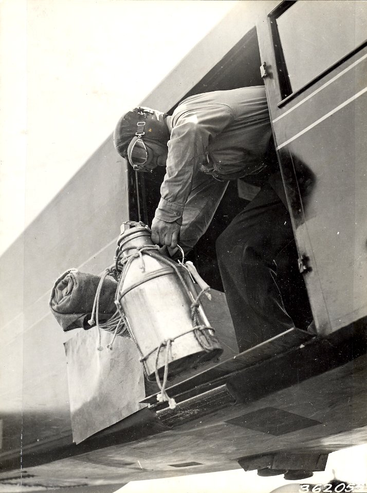 Dropping fire suppression supplies from a plane, 1937