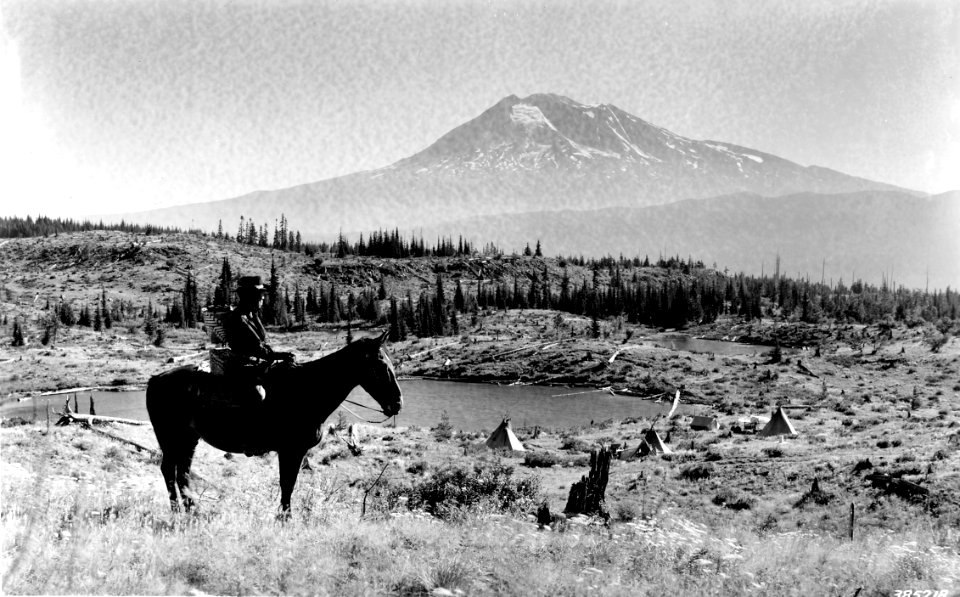 385218 Horseback rider with Mt Adams, Columbia NF, WA 1937
