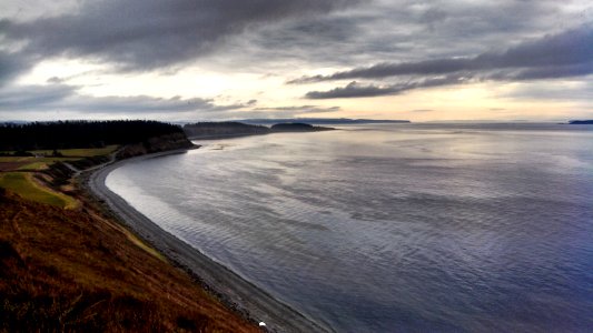 An early fall storm colors the sky over the PNT at Ebey's Landing photo