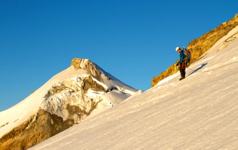 Hiker using Ice Axe along Boulder Ridge, Mt Baker Snoqualmie National Forest