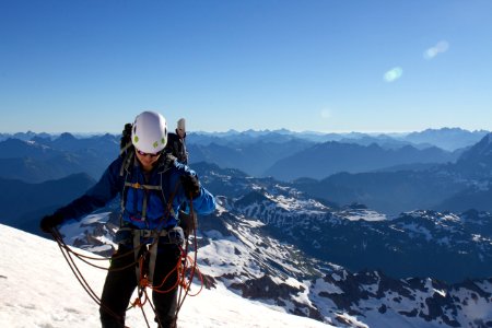 Male Climber setting up Belay along Boulder Ridge, Mt Baker Snoqualmie National Forest