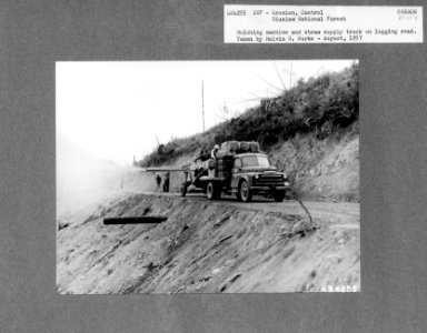 484255 Mulching Machine on Logging Road, Siuslaw NF, OR 1957 photo