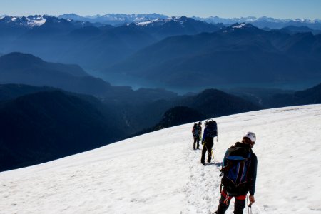 Climbers descending Mt Baker via Boulder Ridge with Baker Lake in Foreground, Mt Baker Snoqualmie National Forest photo