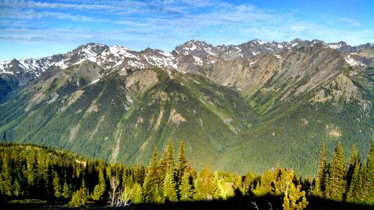 The Olympic Mountains rise up from the Dungeness River drainage in the Buckhorn Wilderness, Olympic National Forest