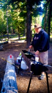 MAN COOKING AT CULTUS LAKE CAMPGROUND-DESCHUTES photo