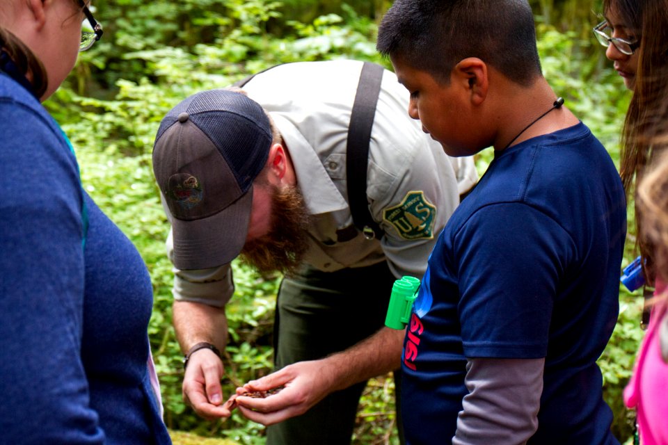 Naturalist with youth at Baker Lake, Mt Baker Snoqualmie National Forest