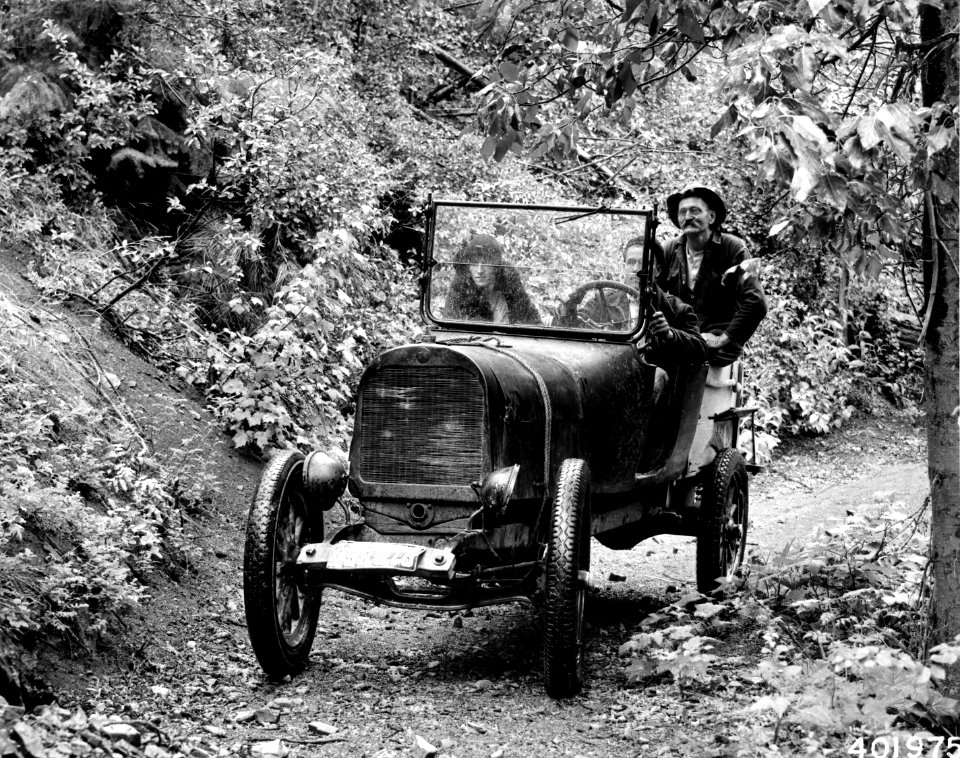 401975 Car on Narrow Gage Rd, Okanogan NF, WA 1934