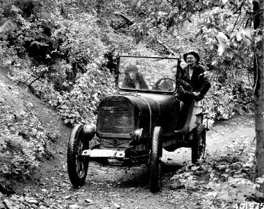 401975 Car on Narrow Gage Rd, Okanogan NF, WA 1934
