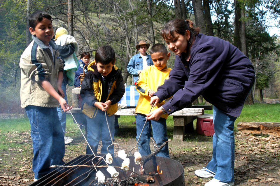Latino Family Roasting Marshmallows