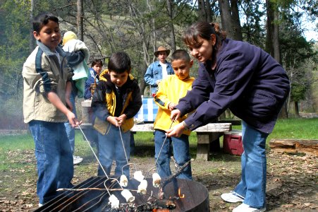 Latino Family Roasting Marshmallows