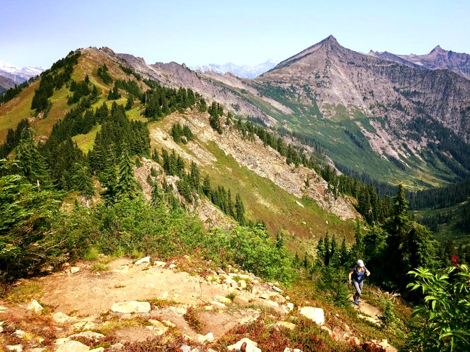 Hiker-UsingWalkingPolesUphill-OkaWenNFbyMasonSchuurUSFS-Aug28-2018