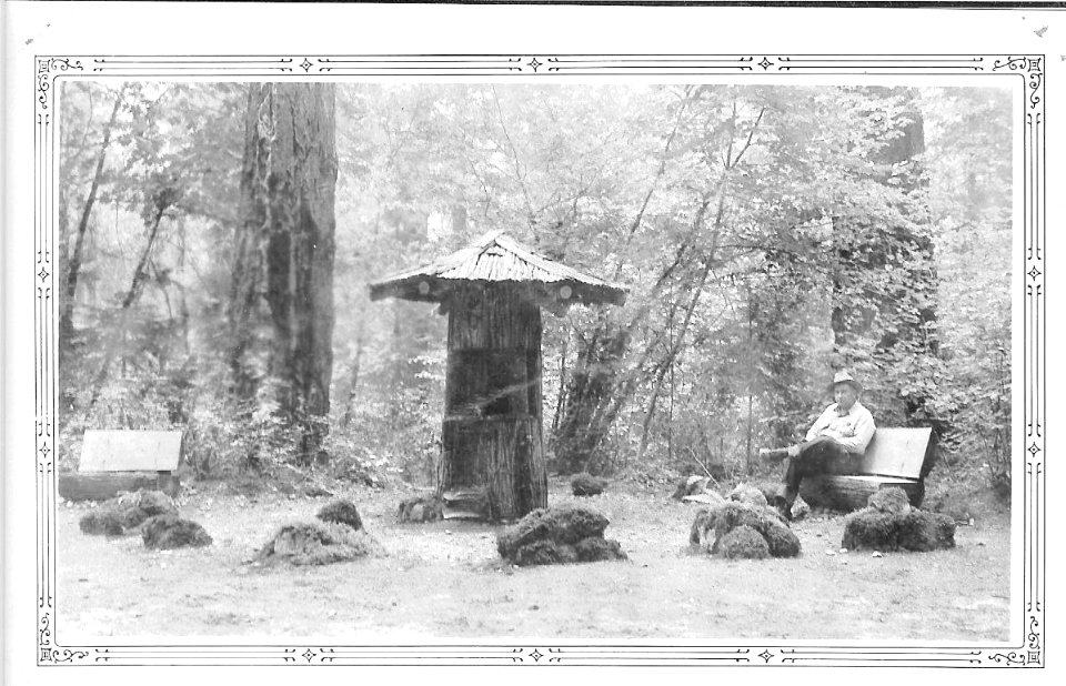 South Umpqua Falls Forest Camp. Drinking fountain with Ranger AE Berry, 1938