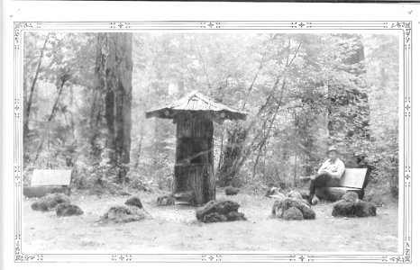 South Umpqua Falls Forest Camp. Drinking fountain with Ranger AE Berry, 1938 photo