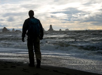 Hiker on the Pacific Northwest Trail at Third Beach, Olympic National Park