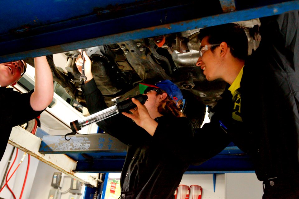 Angell Job Corps Students examining Auto, Siuslaw National Forest