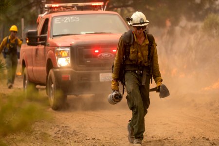 Firefighters conducting burnout operation