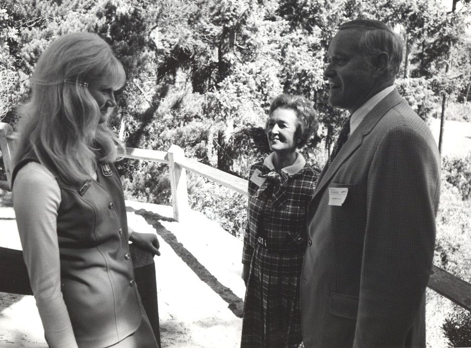 FS woman talking with couple