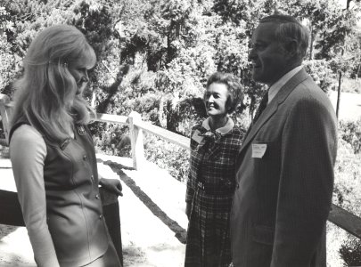 FS woman talking with couple