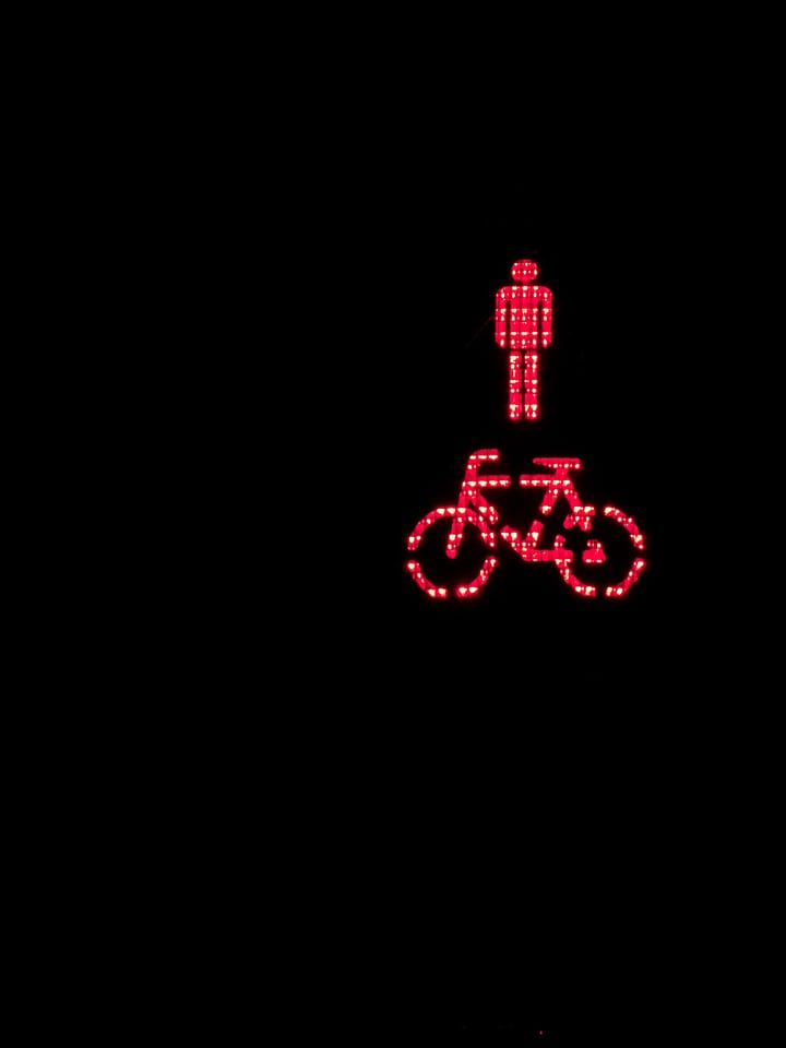 Red traffic lights road crossing