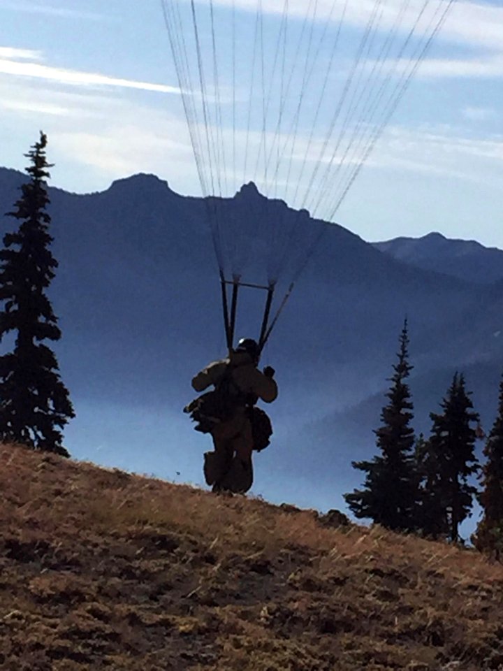 Smokejumper landing near fire, Norse Peak Fire, 2017