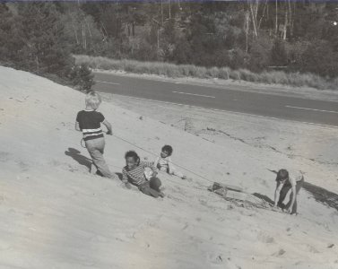 kids playing in the Sand dunes photo