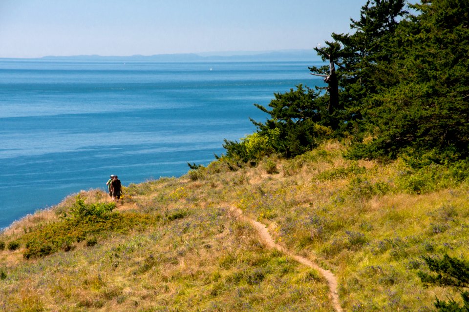 Hikers on the Pacific Northwest Trail on Ebeys Landing
