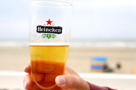 Glass of heineken beer photo
