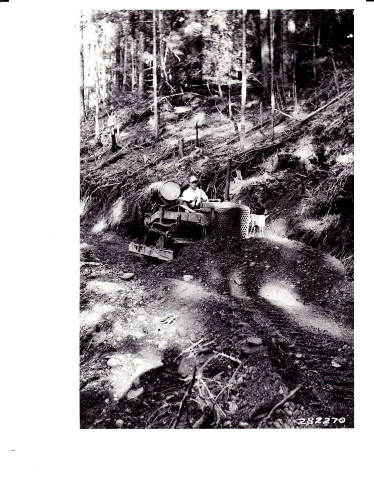 282270 Filling Clay Hole on Skokomish Road, Olympic NF. WA 10-1933