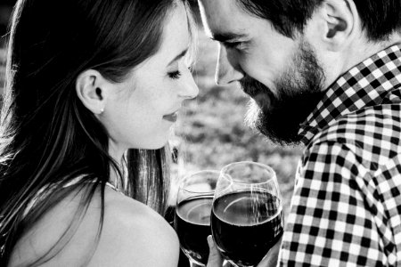 A couple drinking wine photo