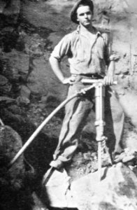 293 CCC worker operating jack hammer 1936
