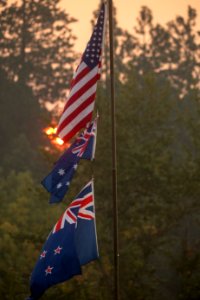 Multi-nation flags flying at camp