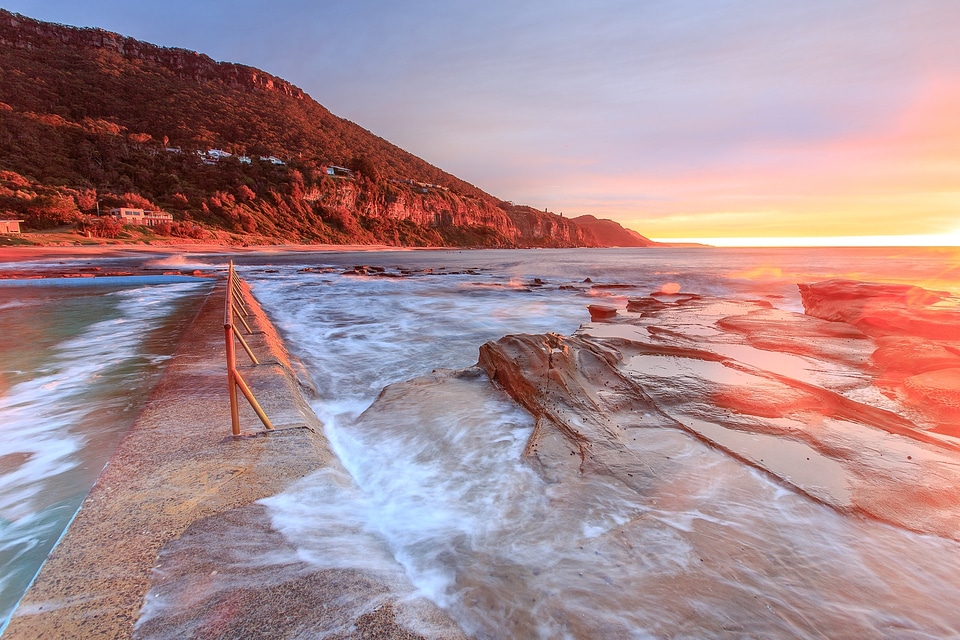 Shore sunset mountains