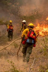 Firefighters conducting burnout operation