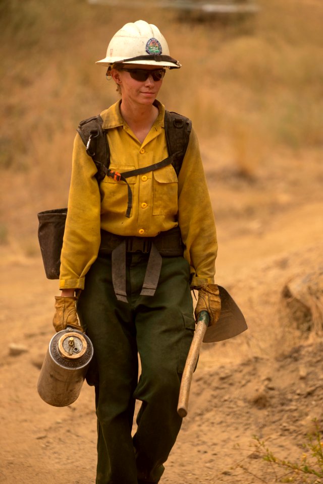 Firefighters conducting burnout operation