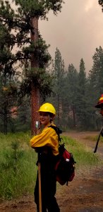 A firefighters monitors progress of Canyon 66 Prescribed fire
