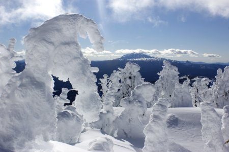 Frozen landscape near the summit of Maiden Peak with Diamond Peak in the background on the Willamette National Forest