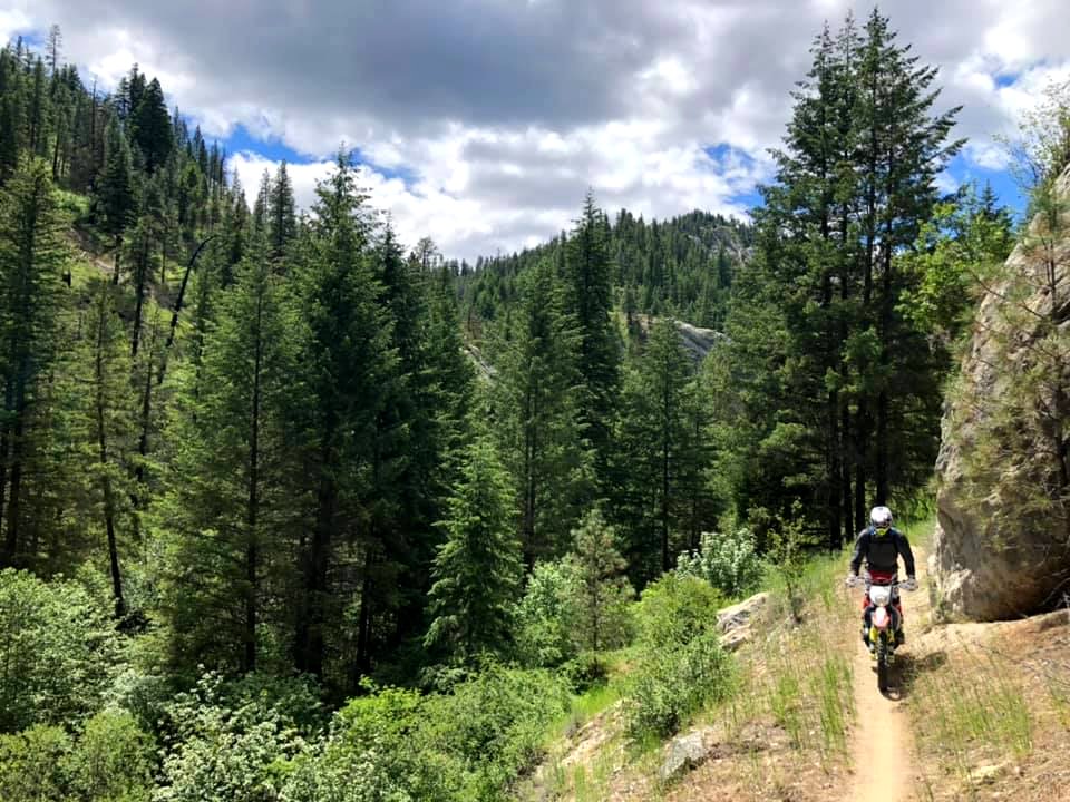 Motorcycle-FS TrailCrewPersonOnMotorcycle-Certifying USFS employees for trail motorcycles(7)OkaWenNFbyMasonSchuurUSFS-June2019