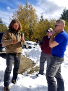 JuvenileFemalSharpShinnedHawk-LoganParrHoldingBird JoshAdsitInBlueReleasedIt JasonRichardsInRedVest PermissionGranted ChelanRD-OkaWenNFbyJanet MillardUSFS 2019-10-05