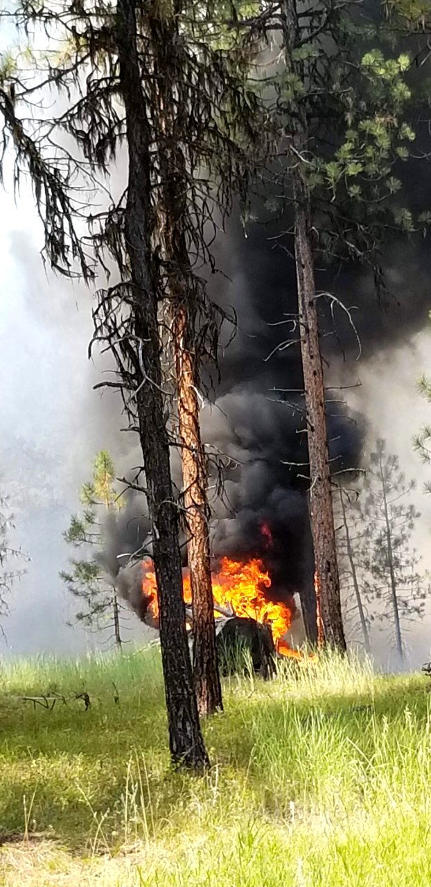 A pile burn sends up billowing black smoke on the Canyon 66 Prescribed fire