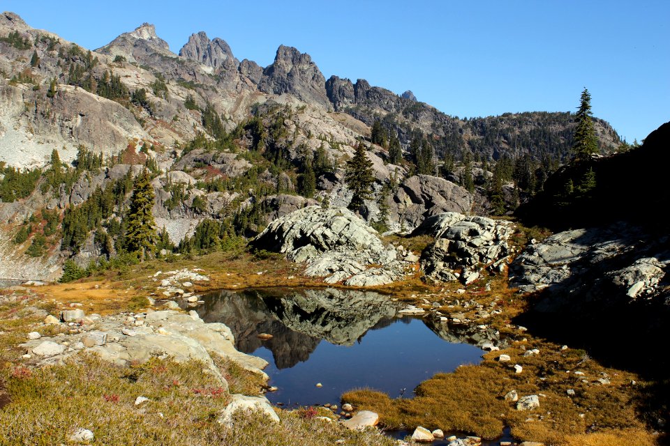 Tarn in autumn and Chikamin Peak, Alpine Lakes Wilderness on the Okanogan-Wenatchee National Forest