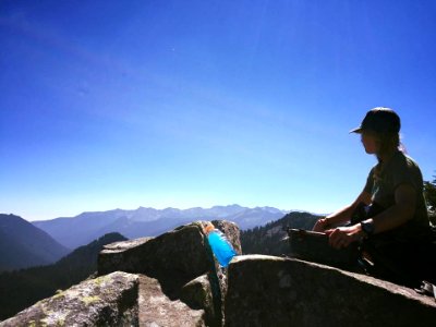Hiker-KatyBinderChillinAtTheSummit-OkaWenNFbyMasonSchuurUSFS-Aug7-2018
