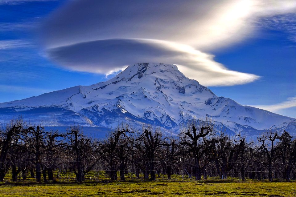 Mt. Hood rises with its head covered in the morning clouds USFS Photo by Ron Kikel