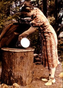 Mt. Hood NF - Woman at Eagle Creek CG Garbage Can, OR c1930 photo